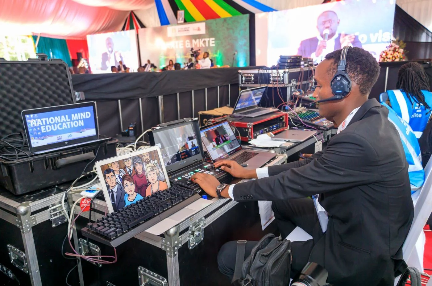Live streaming operator at a broadcast desk