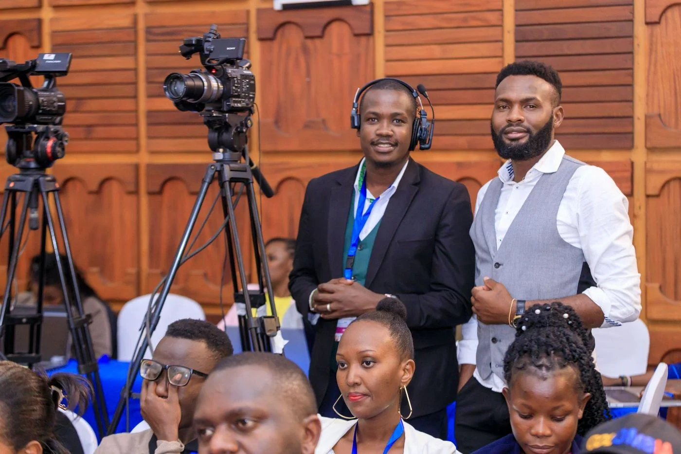 Camera operator smiling at an event